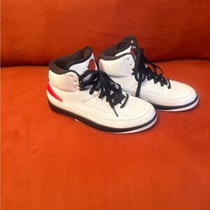 Women’s Jordan’s White and Black High-Top Sneakers Size 8